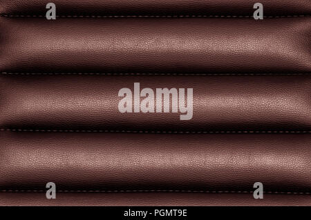 Burgundy wavy leather background with seams Stock Photo