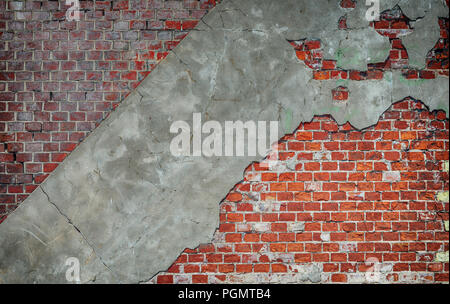 Old brick wall with concrete pieces Stock Photo