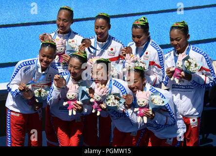 Budapest, Hungary - Jul 18, 2017. The winner synchronized swimming team Japan at the Victory Ceremony of Team Technical. FINA Synchro Swimming World C Stock Photo