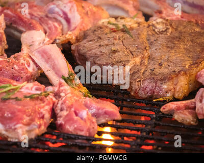 Grilled steak. Ribs on grill. Close up. Stock Photo