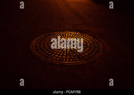 A round manhole cover Stock Photo