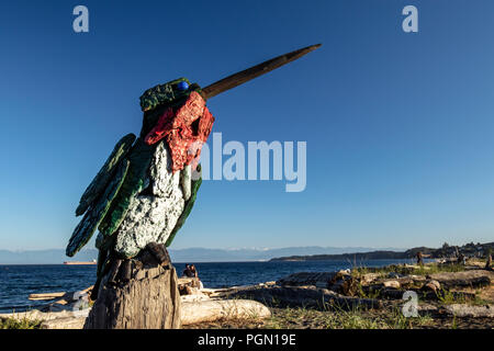 Anna's Hummingbird - Driftwood Art by Paul Lewis - Esquimalt Lagoon, Victoria, Vancouver Island, British Columbia, Canada Stock Photo