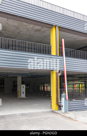 large empty multi-level parking garage with open driveway Stock Photo