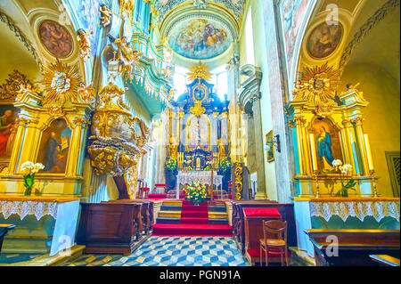 KRAKOW, POLAND - JUNE 11, 2018: Beautiful interior of St Andrew Church decorated with carved plaster, gilden elements and beautiful pulpit, on June 11 Stock Photo