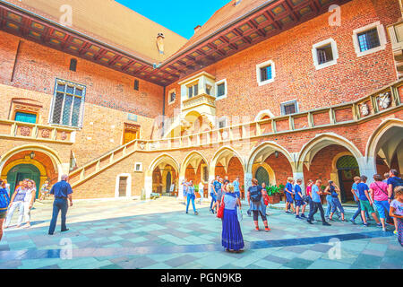 KRAKOW, POLAND - JUNE 11, 2018: Collegium Maius is the oldest building of Jagiellonian University, and its courtyard is the most notable landmark that Stock Photo