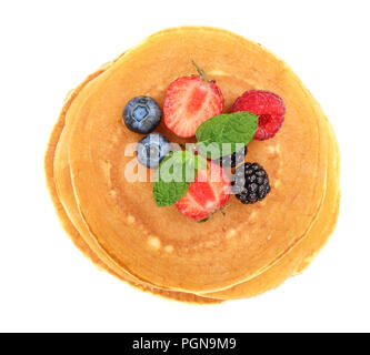 Pancakes stack with strawberry and blueberry isolated on white background. Top view. Flat lay Stock Photo