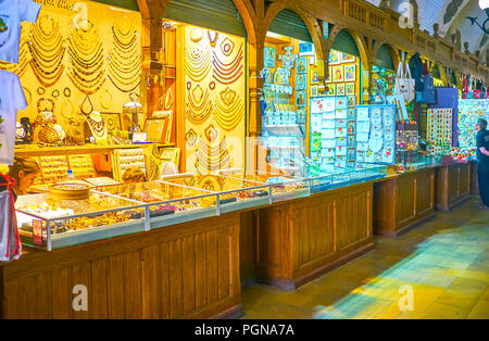 KRAKOW, POLAND - JUNE 11, 2018: The jewelry stall at Cloth Hall (Sukiennice) offers variety of traditional Polish amber pieces, on June 11 in Krakow Stock Photo