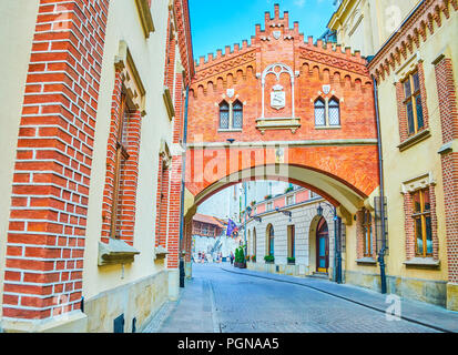 KRAKOW, POLAND - JUNE 11, 2018: Historical Pijarska street famous for its edifices such as Czartoryski Museum with its beautiful covered pass across t Stock Photo