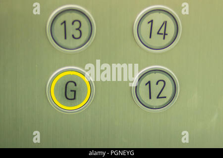 View of elevator buttons pressed lift down to ground floor Stock Photo