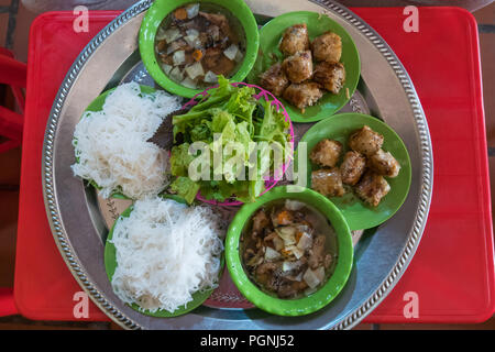 'Bun Cha' is a Vietnamese dish of grilled pork and noodle, which is thought to have originated from Hanoi, Vietnam. Stock Photo