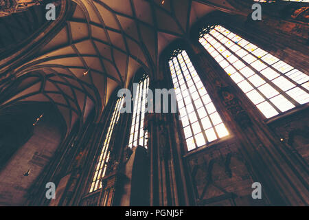 Ancient glass in the Catholic Church Stock Photo