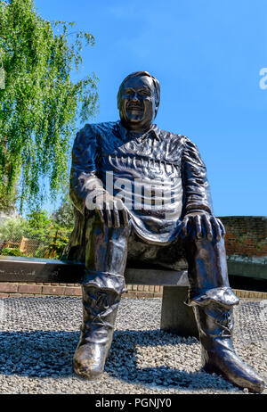 Bronze statue of Dave Lee the famous pantomime dame outside the Marlowe theatre Canterbury Stock Photo