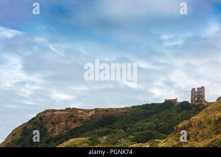 Dramatic cliff side landscape with Scarborough Castle in North Yorkshire. Stock Photo