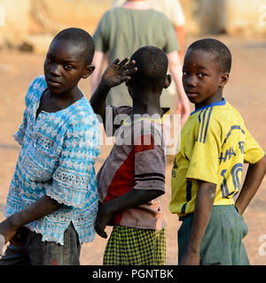 DAGOMBA VILLAGE, GHANA - JAN 14, 2017: Unidentified Dagomban children play in the local village. Dagombas are ethnic group of Northern Ghana Stock Photo