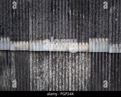 Old grunge ceramic roof tiles wall background and texture. Stock Photo