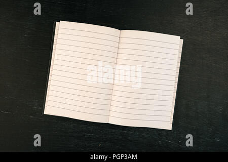 Open blank ruled notebook pages, top view copy space Stock Photo