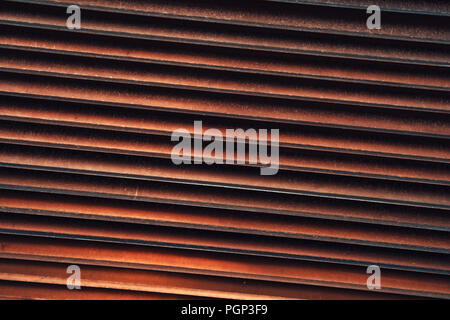 Rusty metal shutters as background and urban industrial texture Stock Photo