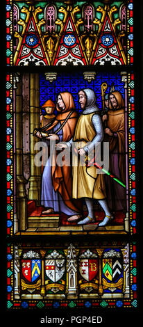 Stained Glass in the Basilica of the Holy Blood in Bruges, Belgium, depicting the Relic of the Holy blood brought from the Holy Land by Crusader Thier Stock Photo