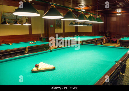 A Pool Table, set up for a game A game of 8 Ball racked and ready to go Stock Photo