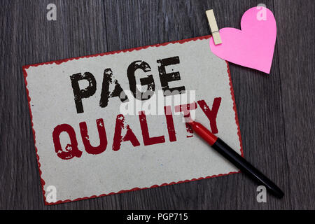 Text sign showing Page Quality. Conceptual photo Effectiveness of a website in terms of appearance and function White page red borders marker clothesp Stock Photo