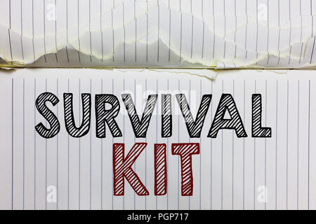 Handwriting text Survival Kit. Concept meaning Emergency