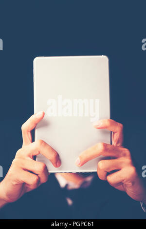 businessman using tablet smartphone for working in the office Stock Photo