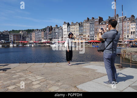 tourists in Honfleur, Normany Frace Stock Photo
