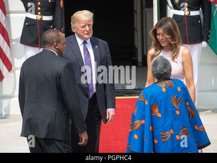 Donald Trump (center left) and Melania Knauss (center right) with