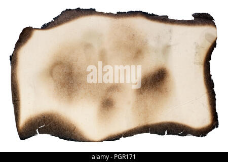 A small piece of yellow aged vintage  paper with burned  black edges. Isolated on white studio macro shot Stock Photo