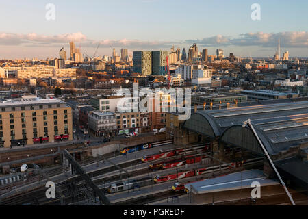 LONDON, UK - MARCH 7, 2018 : High, wide, daytime view of  London's skyline, with King's Cross Station in the foreground and the city landmarks in the  Stock Photo