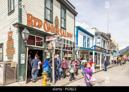 Tourists viewing the Red Onion Saloon, a historic brothel museum, in Skagway, Alaska USA Stock Photo