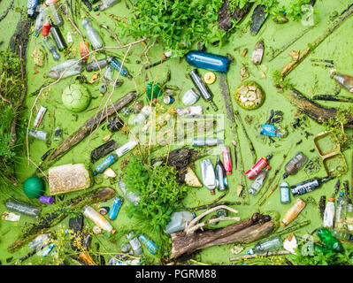 Plastic bottles and rubbish in UK river Stock Photo