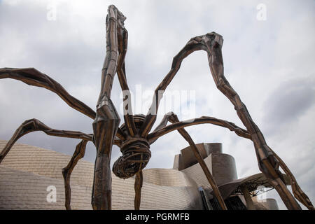 BILBAO, SPAIN - JULY 25, 2018: Edition of sculpture called Maman by Louise Bourgeois is on display outside of Guggenheim Museum Bilbao, one of the mos Stock Photo