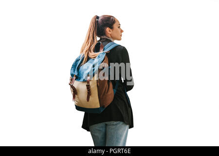 Girl or teenager with backpack isolated on white background. Stock Photo