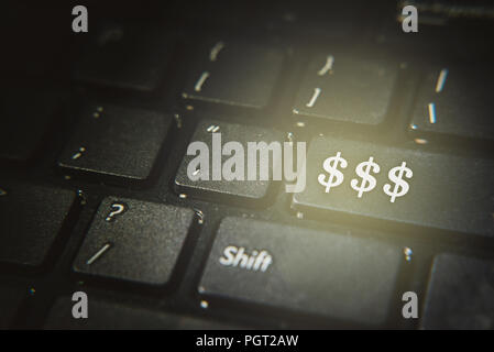 close up of Dollar symbol on a computer keyboard button. concept of digital online business,finance and shopping Stock Photo