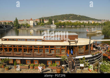 Landscape view of the restaurant of the floating hotel 'Botel Matylda', which is moored on the River Vltava in the centre of Prague. Stock Photo