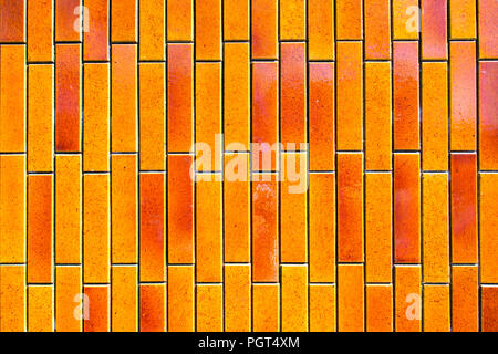 A view of porcelain ceramic tiles in orange color Stock Photo