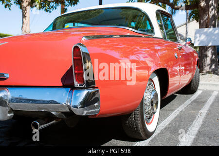 A view of a rare classic vintage American car in a parking lot Stock Photo