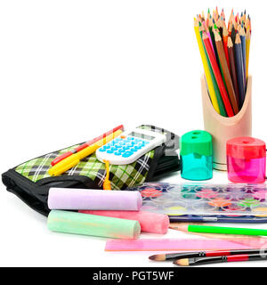 Collection of school supplies, isolated on pure white background. Stock Photo