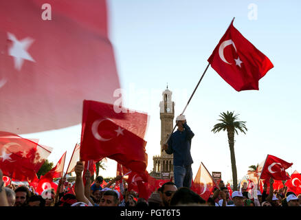 Izmir, Turkey - June 15, 2018: June 15 Day of Democracy in Turkey Izmir. People holding Turkish flags at Konak square in Izmir and in front of the his Stock Photo