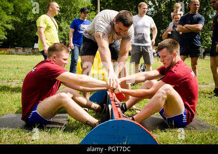 Komsomolsk-on-Amur, Russia, August 1, 2015. amateur mas wrestling competition among men Stock Photo