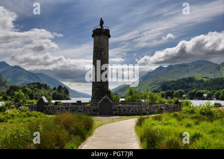 Glenfinnan Monument to the Jacobite uprising with mountains around Loch Schiel in Lochaber Scottish highlands Scotland United Kingdom Stock Photo