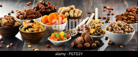 Composition with dried fruits and assorted nuts. Delicacies Stock Photo