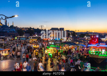 ISTANBUL, TURKEY - AUGUST 14: A crowd of people walking at Eminonu Square in Istanbul. on August 14, 2018 in Istanbul, Turkey. Stock Photo