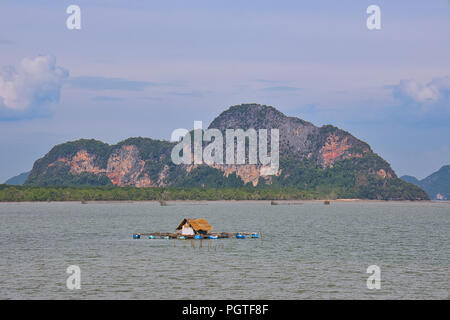 Phang Nga Bay is located north of Phuket, full of idyllic undulating hill, remote places with vast open spaces, the view it offers are astonishing. Stock Photo