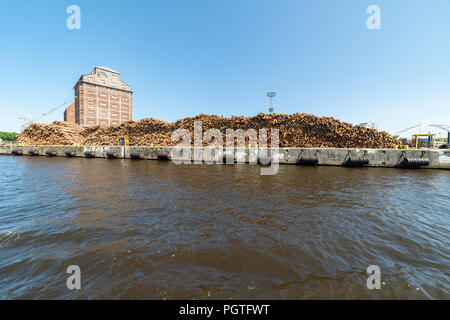 a lot of wood in the port Stock Photo