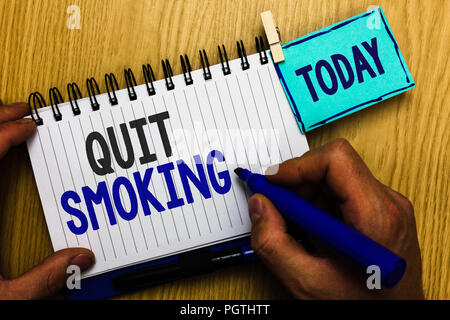 Conceptual hand writing showing Quit Smoking. Business photo showcasing Discontinuing or stopping the use of tobacco addiction Man holding marker expr Stock Photo