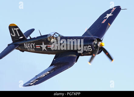 MONROE, NC - NOVEMBER 10:  World War II Navy Corsair Fighter Performing during Warbirds Over Monroe Air Show in Monroe, NC, on November 10, 2013. Stock Photo