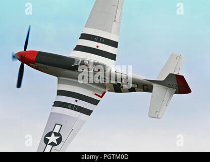 MONROE, NC - NOVEMBER 4:  World War II P-51 Mustang Fighter Performing during Warbirds Over Monroe Air Show in Monroe, NC, on November 4, 2012. Stock Photo