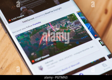 New york, USA - august 28, 2018: Twitch streaming service menu on smartphone screen background close up view Stock Photo